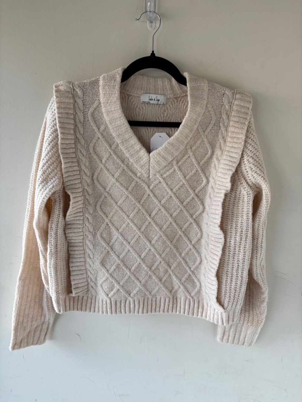 Sadie & Sage Cream Cable Knit V-Neck Sweater with Ruffle Trim
